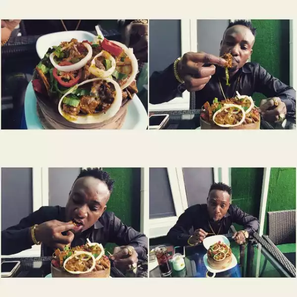 African Man! Kcee Shares Photo Of Himself Enjoying ‘Goat-Head’ – PHOTO