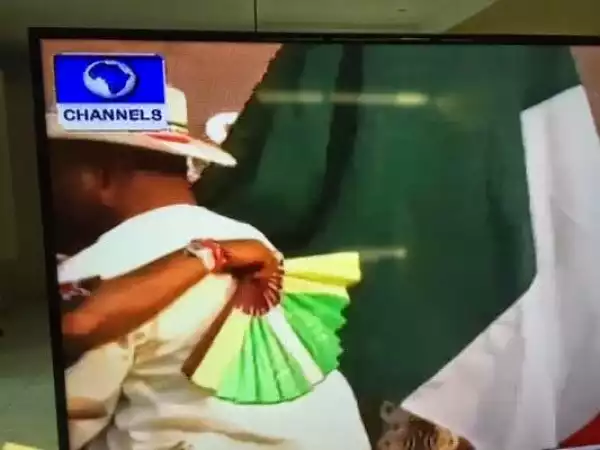 Between Governor Akpabio and his wife at PDP rally.