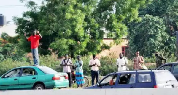 Checkout Photo Of Punishment Two Drivers Were Served By Some Military Men In Abuja