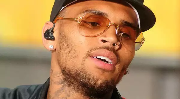 Chris Brown Finds Strange Naked Woman In His Bed