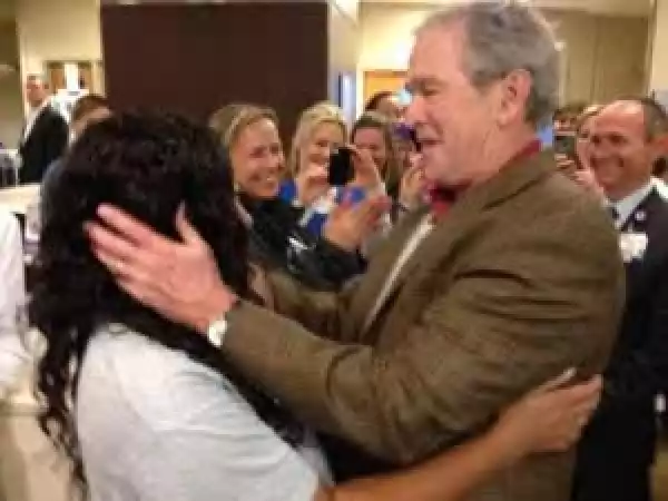 Ex US President, George Bush Kisses Cured Ebola Infected Nurse