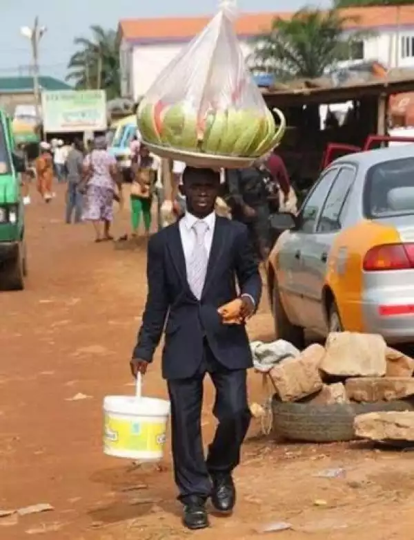 Ghanaian Man Dresses In A Suit To Sell Water Melon On The Streets