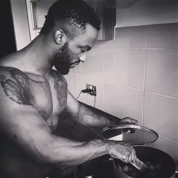 Iyanya and his sexy abs cook in the kitchen..