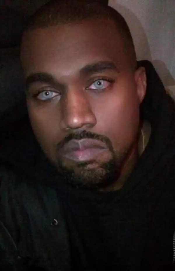 Kim and Kanye rock blue contact lenses...