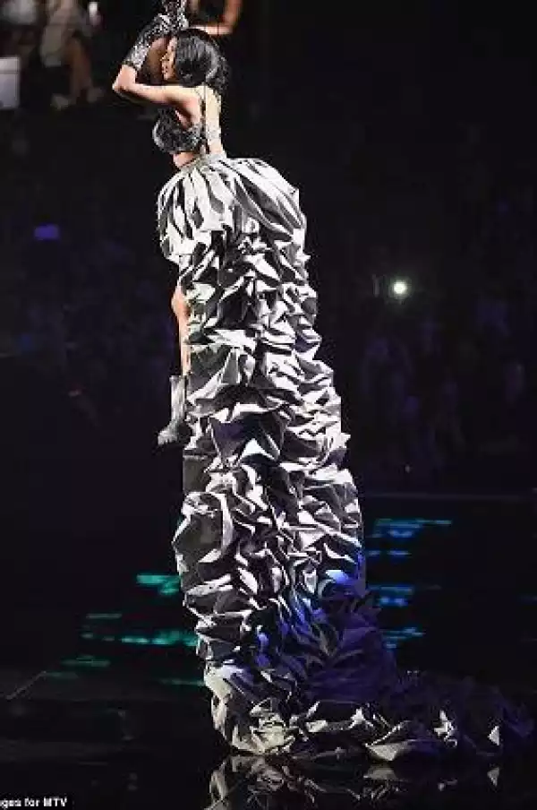 Nicki Minaj shocks crowd as she appears on stage with 14ft ruffle skirt