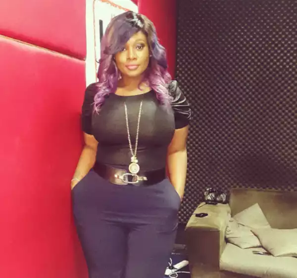 OAP Toolz shows off her curves and purple weave...