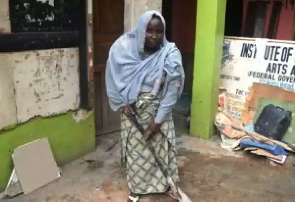 OMG!!!! Have You Seen This Nigerian Woman Who Is A Painter, Tiler, Plumber? (SEE PHOTO)