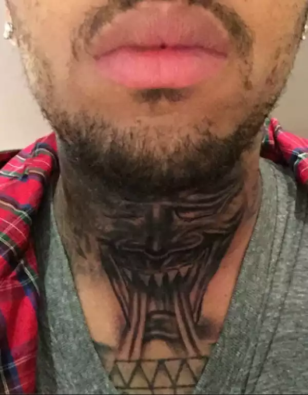 Oh wow! What kind of tattoo did Chris Brown just get? (Photo