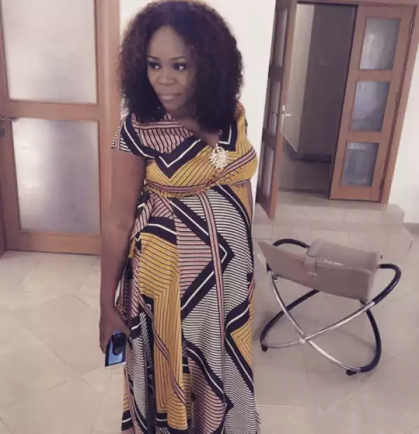 Omawumi proudly shows off growing baby bump