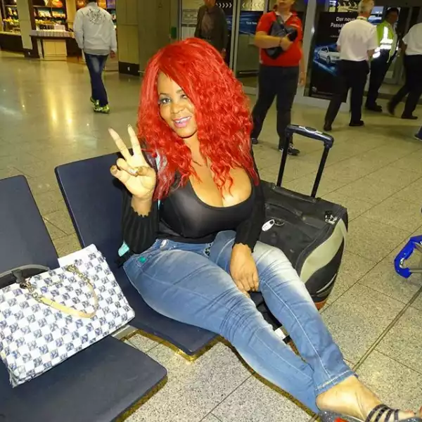 Photo: Cossy Arrives Germany, Explains Why She Shows Off Visa