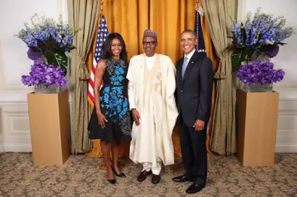 Photo: President Buhari Strikes A Pose With Michelle And Barack Obama