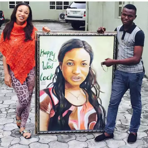 Photo: Tonto Dikeh-Churchill Shows Of Her Portrait Presented To Her By A Fan