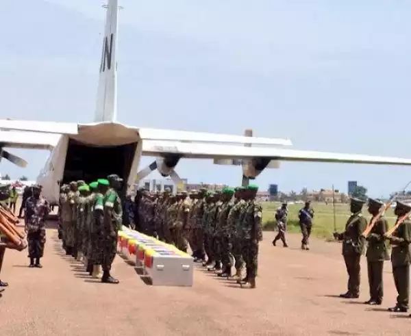 Photos: 10 Bodies Of Ugandan Soldiers Killed In Terror Attack Arrives Uganda In A UN Plane