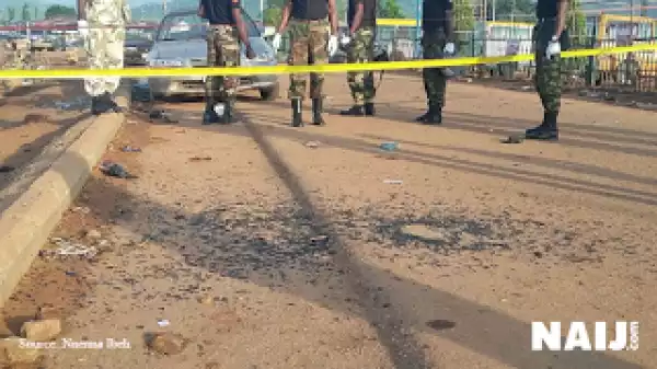 Photos: Abuja Blast Scene During Investigation