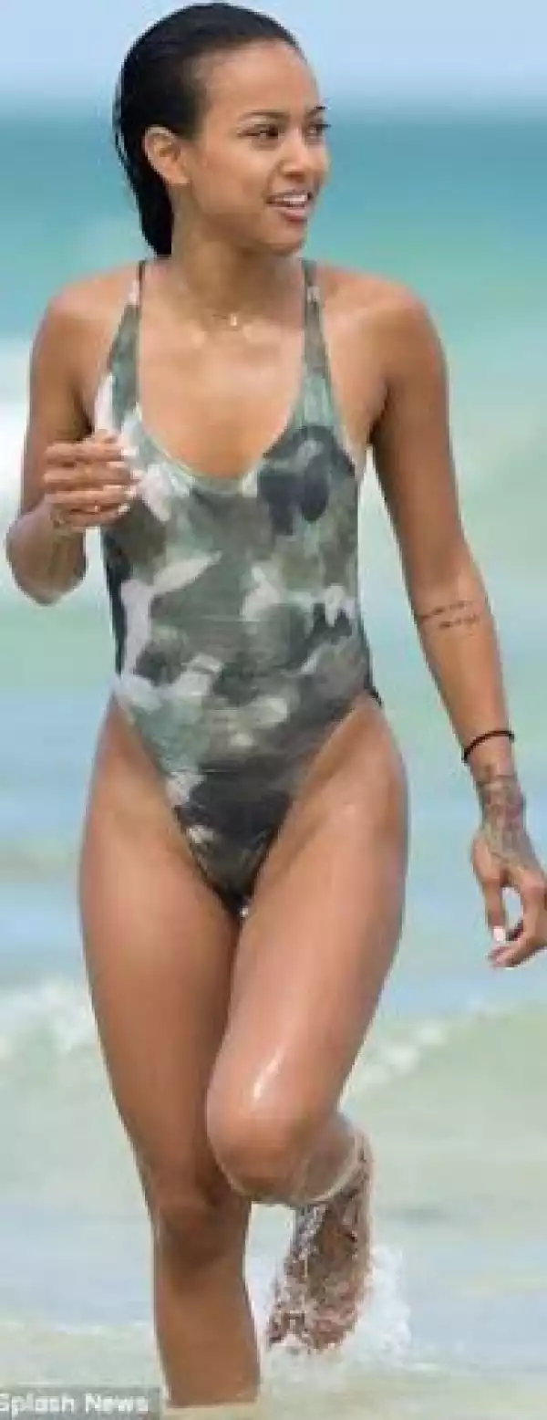 Photos: Actress Karrueche Shows Off Her Bod At The Beach In A Sexy Swimsuit