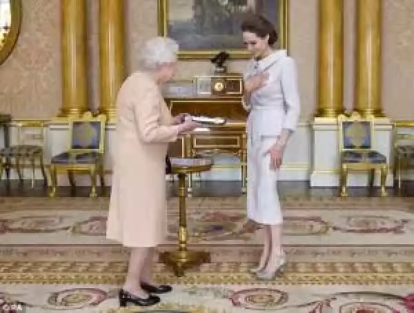 Photos: Angelina Jolie gets Honoured with "DameWood" by Queen of England During her Visit