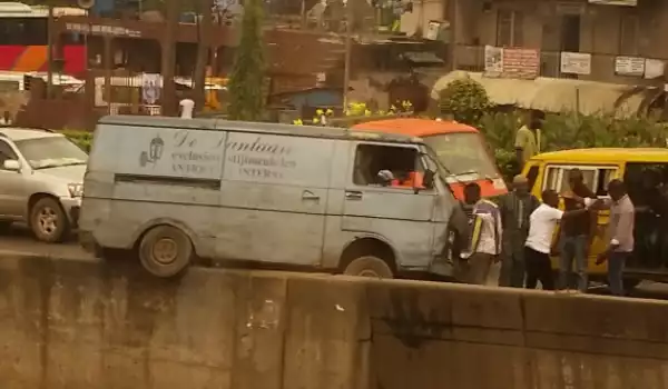 Photos: Bus Nearly Falls Off Ojuelegba Bridge