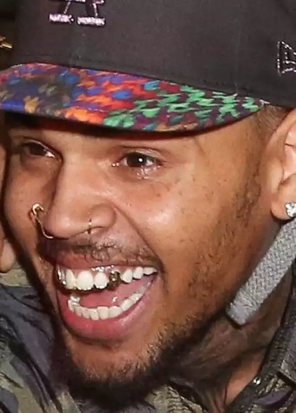 Photos: Chris Brown wears safety pins in his nose