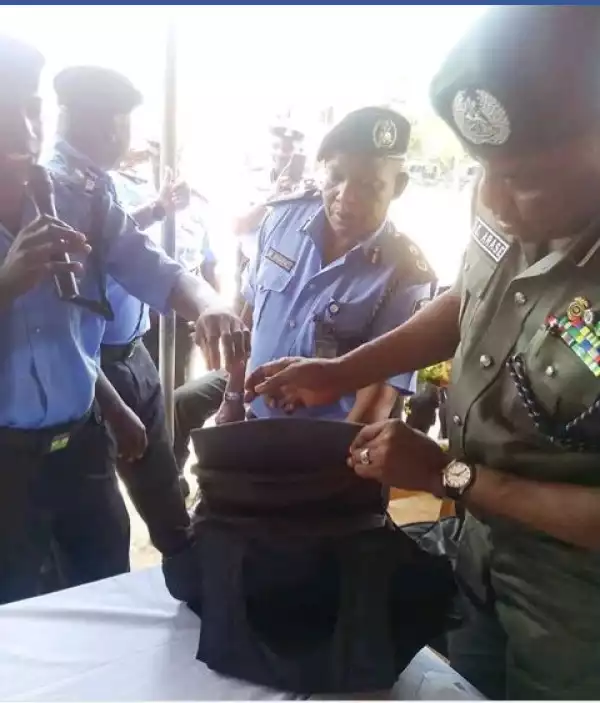 Photos: Policeman Who Made Bullet Proof From Local Materials Decorated With New Rank