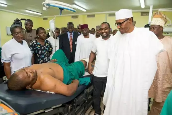 Photos: Pres. Buhari Visits Abuja Blast Victims In Hospital
