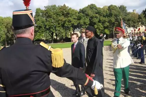 Photos: President Buhari Inspecting Guard Of Honour In France