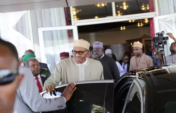 Photos: President Buhari Returns To Nigeria After France Visit
