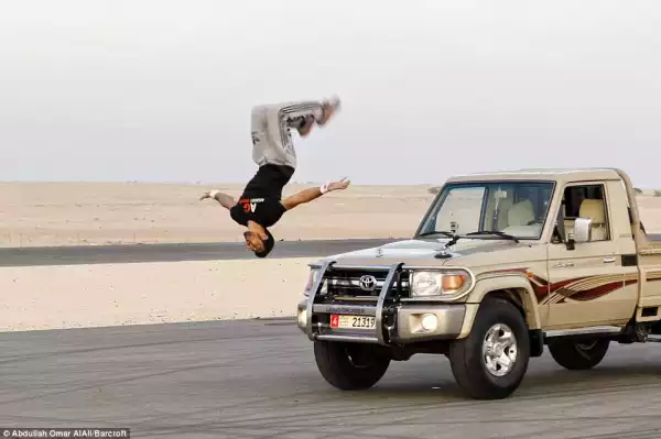 Photos: World’s Most Dangerous Stunt By Street Gyminst On moving truck