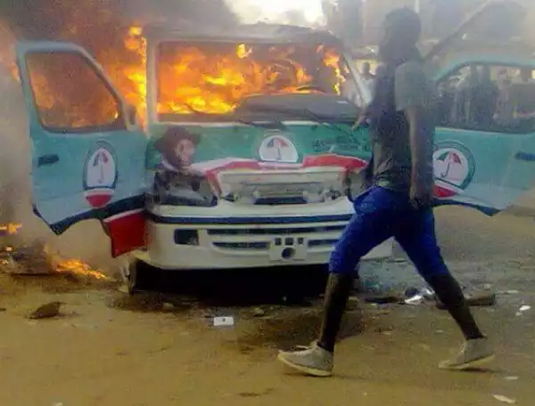 Photos: Youths Set Pres. Jonathan’s Campaign Bus Ablaze in Jos