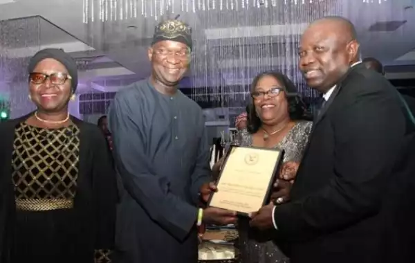 Pics: Governor Ambode Presents Gift To Ex Gov. Fashola At Law Dinner