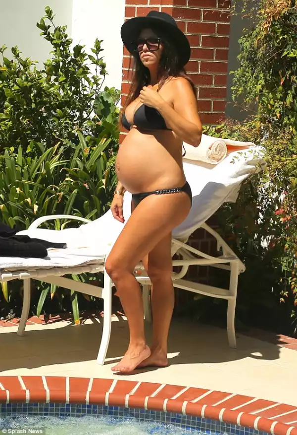 Pregnant Kourtney Kardashian Shows Off Baby Bump In Skimpy Bikini | PHOTOS