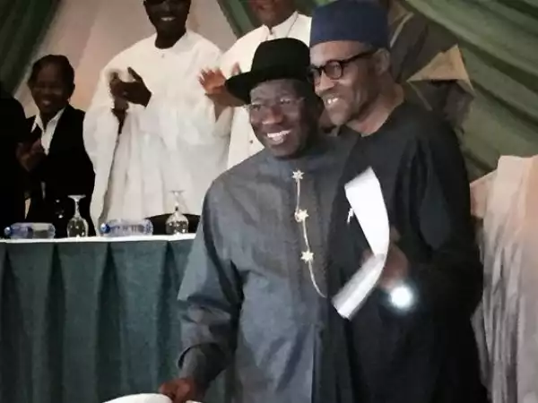 Pres. Jonathan & Buhari Hug as They Sign Peace Accord This Morning