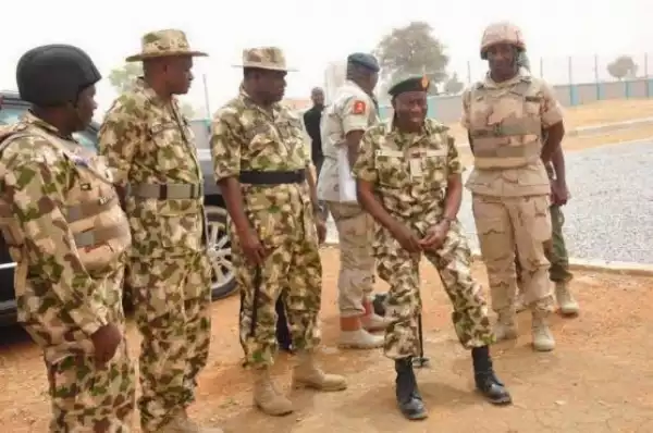 Pres. Jonathan dons military uniform as he visits Baga, Mubi