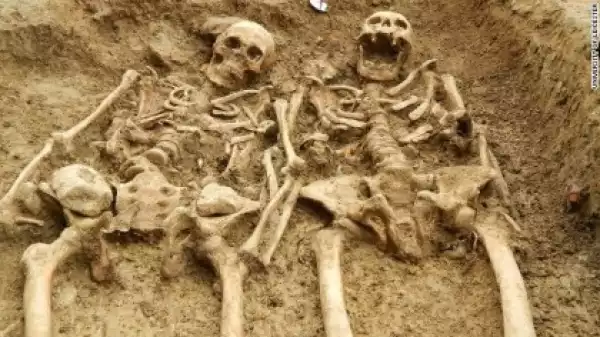 Skeletons found ‘holding hands’ after 700 years
