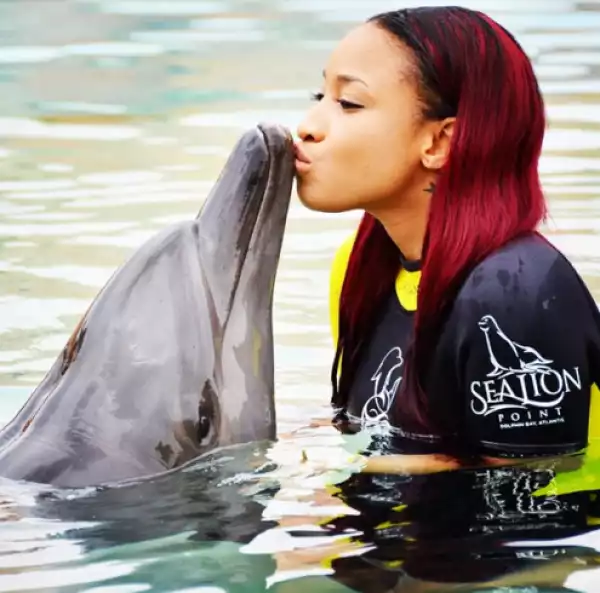 Tonto Dikeh Kisses Dolphins