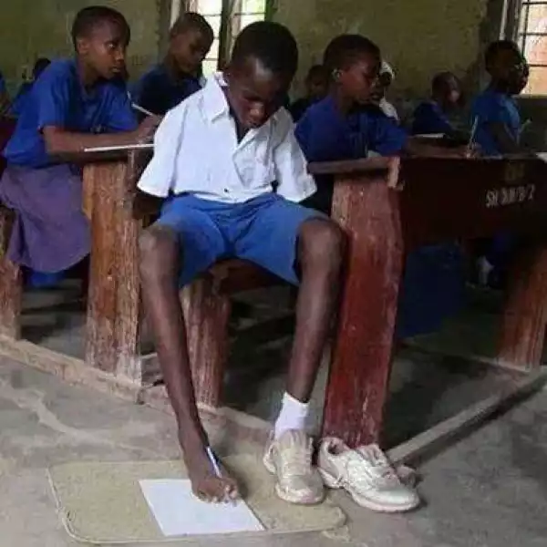 Touching Photo Of A Boy Without Hands Learning & Writing With His Toes