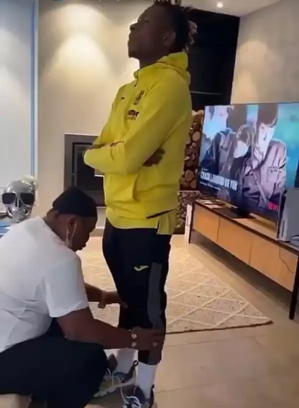 Footballer, Samuel Chukwueze’s Mother Seen Praying For Him Before Departing For AFCON (Video)