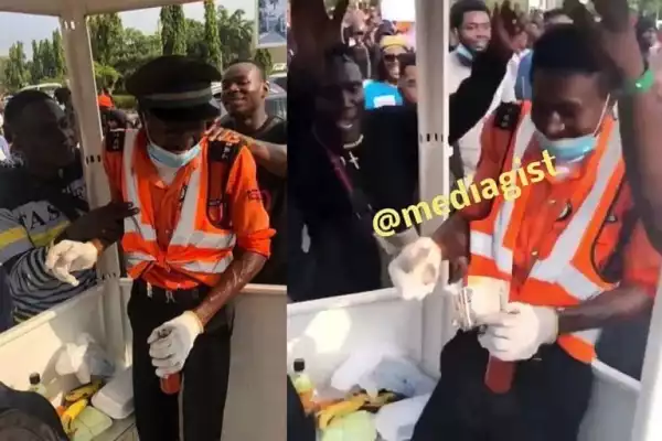 Traffic Warden In Tears As Protesters Shower Him With Food, Drinks And Cash (VIDEO)