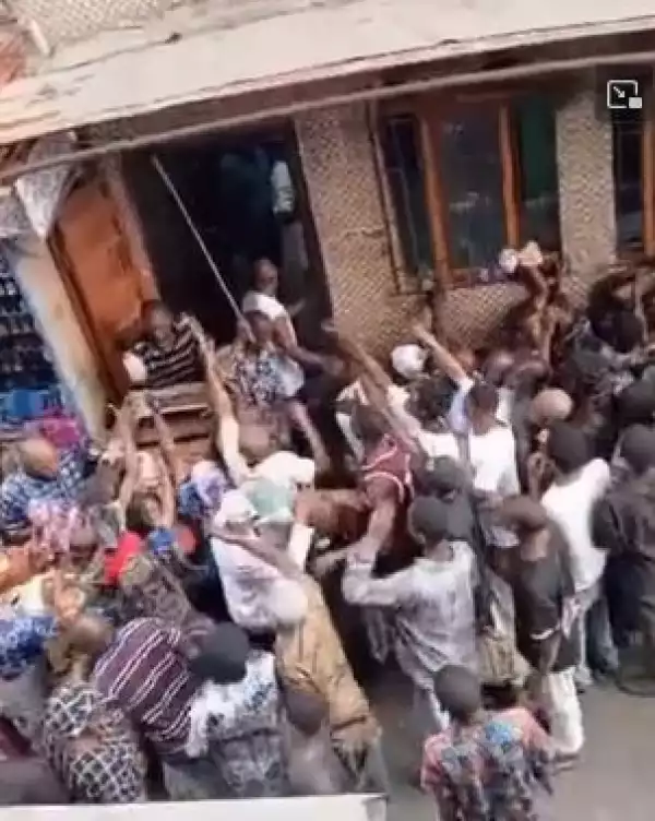 Lagos Residents Flogged While Collecting Free Bread From Government (Video)