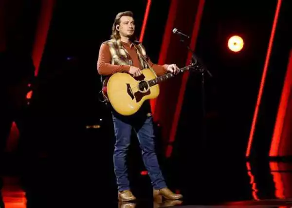 Singer, Morgan Wallen falls on stage during concert