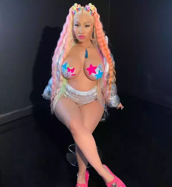 Nicki Minaj puts her naked boobs on display as her new Trollz video trends at no 1 shortly after release