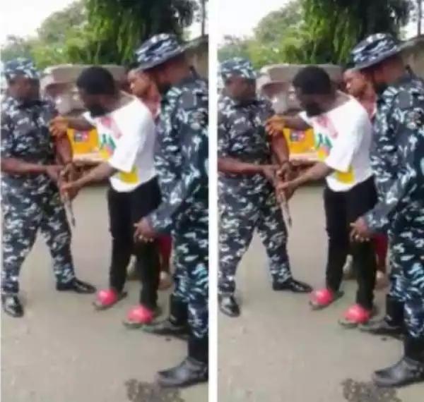 Drama As Two Lagosians Assault Policemen, Drag Gun With Them (Video)