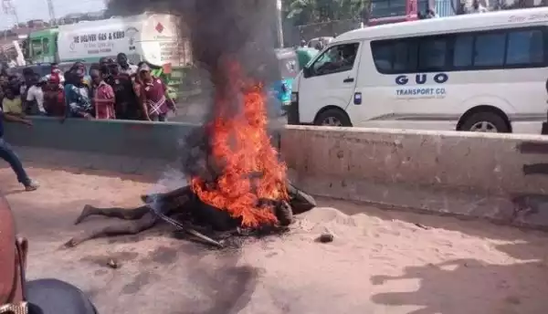 JUNGLE JUSTICE!!! Angry Mobs Set POS Thieves Ablaze In Akwa Ibom