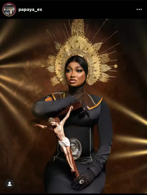 Outrage As Lady Shares Controversial Photoshoot Using The Crucifix