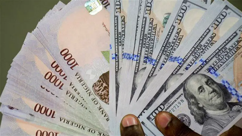Naira exchanges at N464.67 to dollar