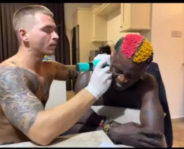 Singer, Portable Almost Breaks Down In Tears While Getting A Face Tattoo (Video)