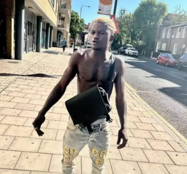 Portable Goes Shirtless After Arriving UK, Spotted Smoking With Friends (Video)