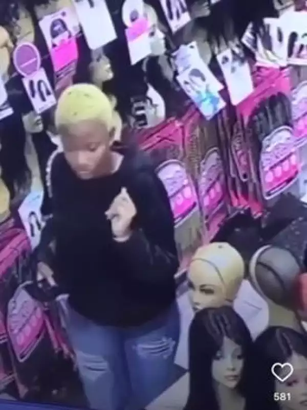 Young Lady Caught Stealing Wig From Store (Video)