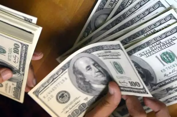 Drama As Man Is Caught Trying To Deposit Fake Dollar Bills At POS Shop In Kano