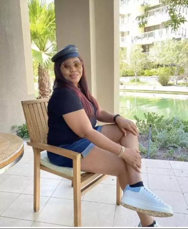 “Your Mates Are Happily Married” – Regina Daniels Mother Dragged Mercilessly For Sharing Photo of Herself In Bum Short