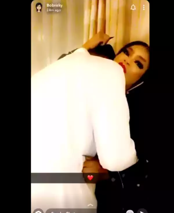 Bobrisky spotted lying with a man on same bed (video)
